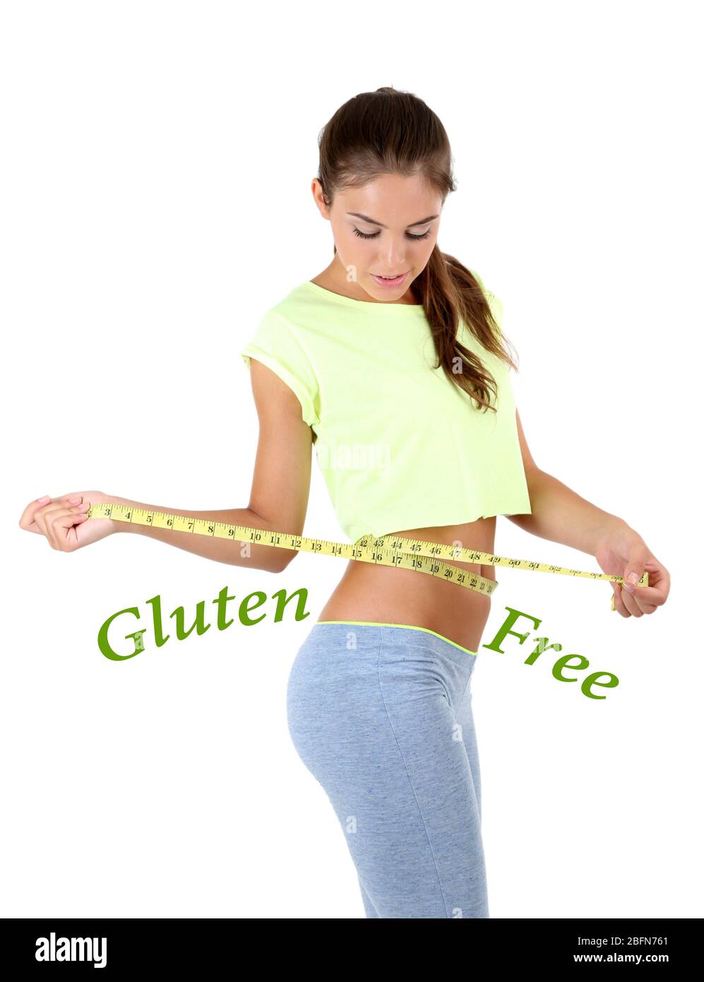 Young slim woman measuring her waist and text Gluten free isolated on white  Stock Photo - Alamy