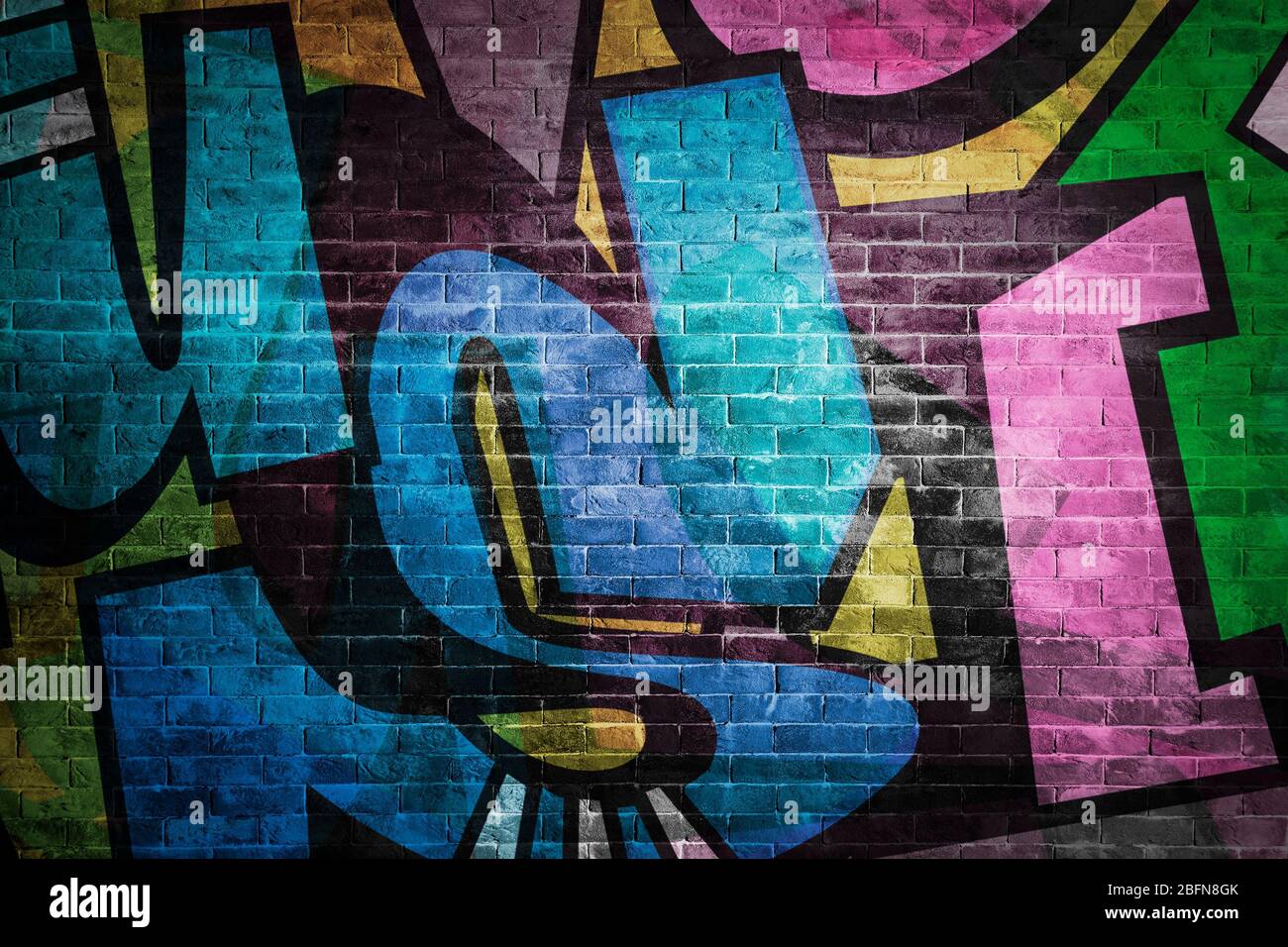 Colorful Graffiti Letters On Brick Wall Background Stock Photo Alamy