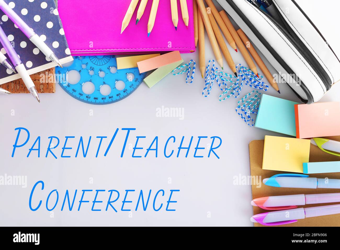 Stationary with text PARENT/TEACHER CONFERENCE on white background. School concept. Stock Photo