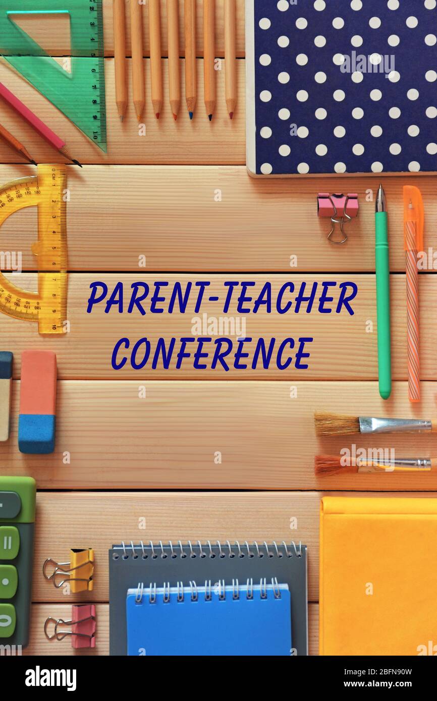Text PARENT-TEACHER CONFERENCE and stationery on wooden background. School concept. Stock Photo