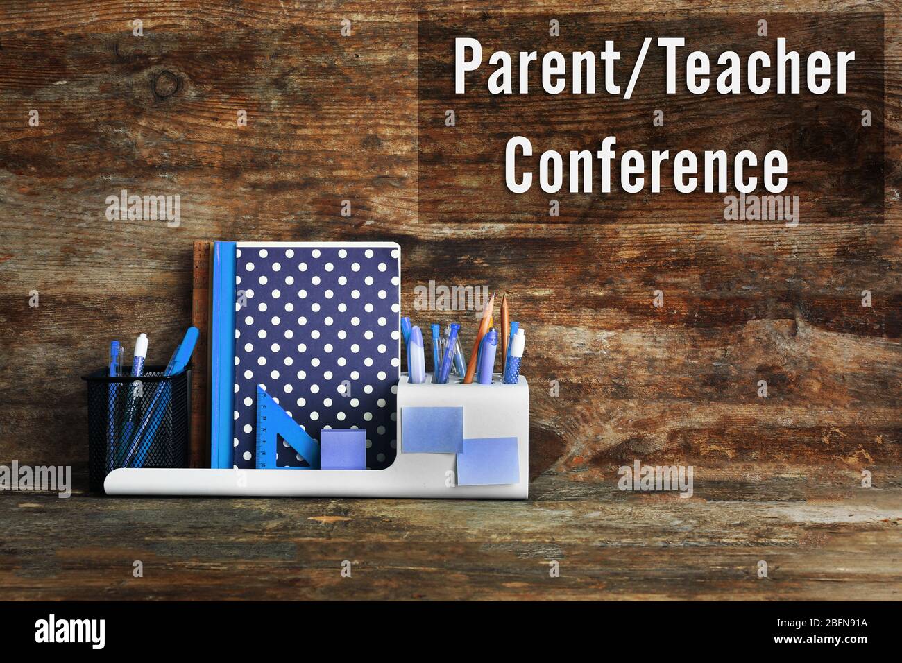 Stationary with text PARENT/TEACHER CONFERENCE on wooden background. School concept. Stock Photo