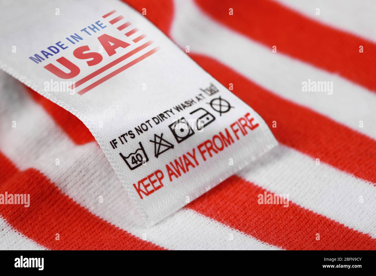 Garment label with text MADE IN THE USA, closeup. Manufacturing quality concept Stock Photo Alamy