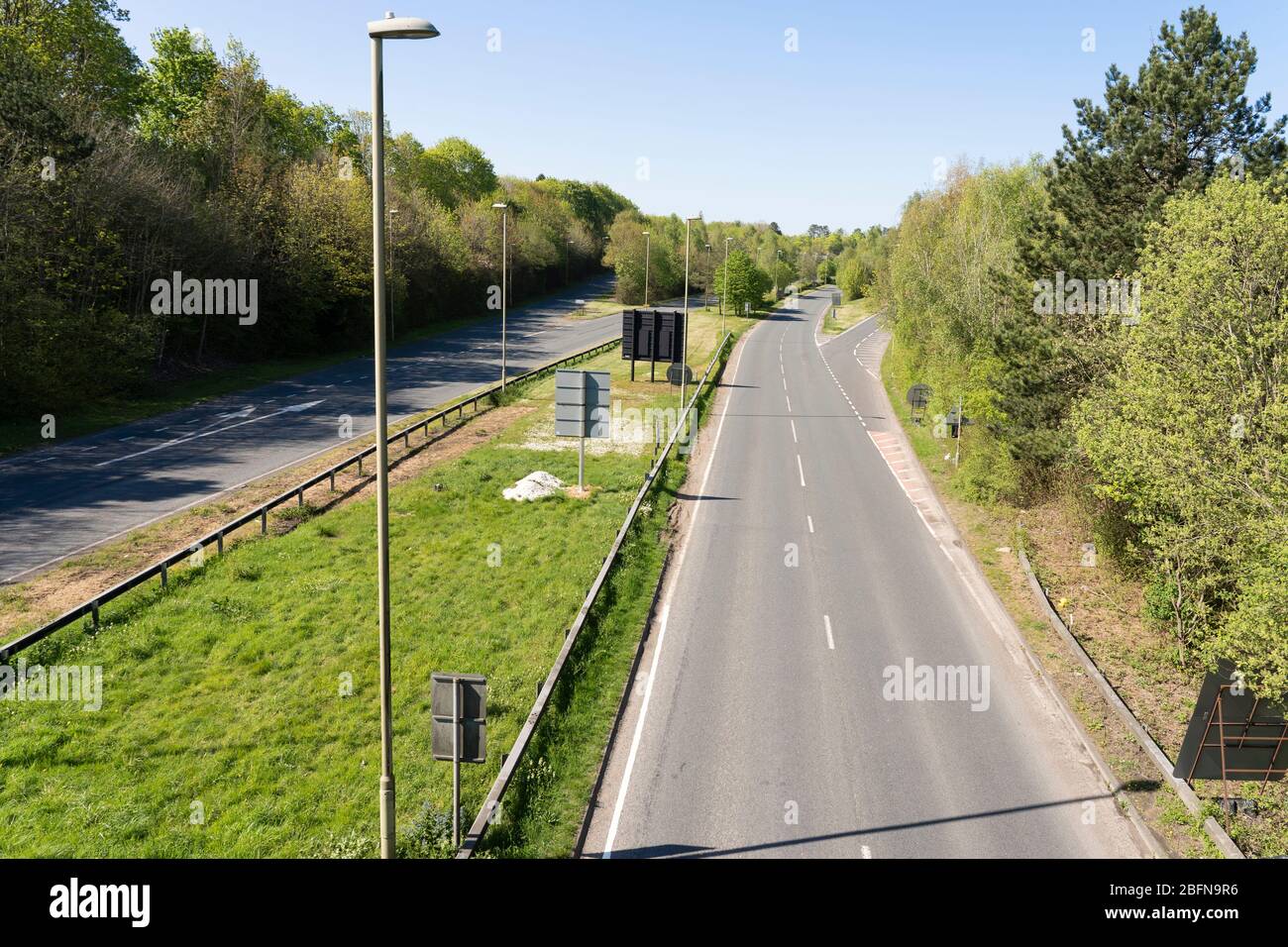 An empty dual carriageway with no traffic in Basingstoke during the Coronavirus Covid 19 pandemic, April 2020, UK Stock Photo