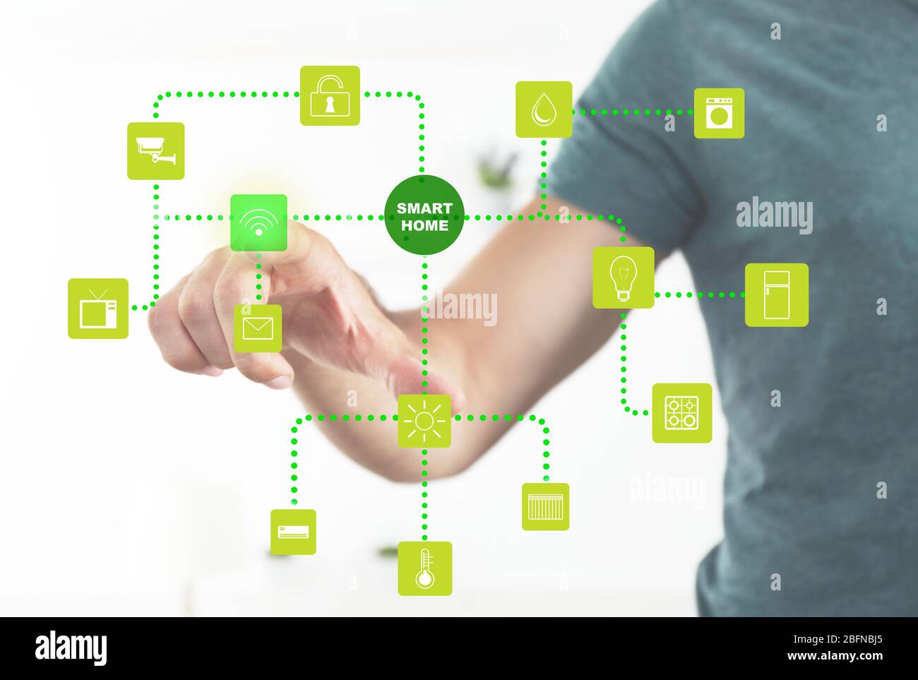 Man using smart home application on virtual screen. Innovation technology concept. Stock Photo