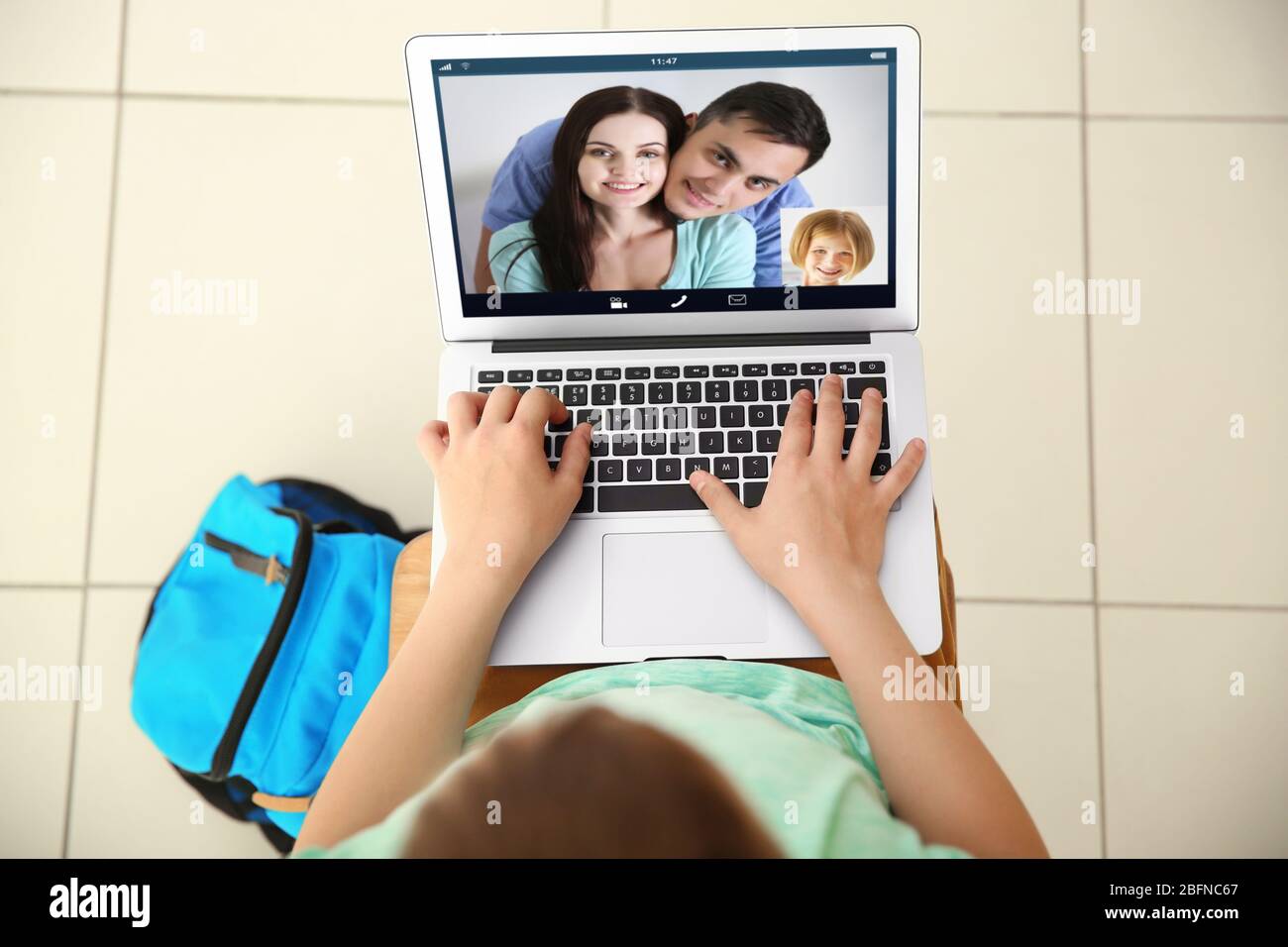 Video call and chat concept. Boy video conferencing on laptop Stock Photo