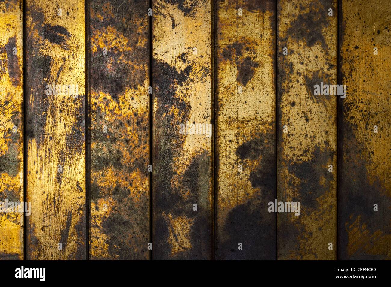 Grunge worn textured copper and gold background Stock Photo