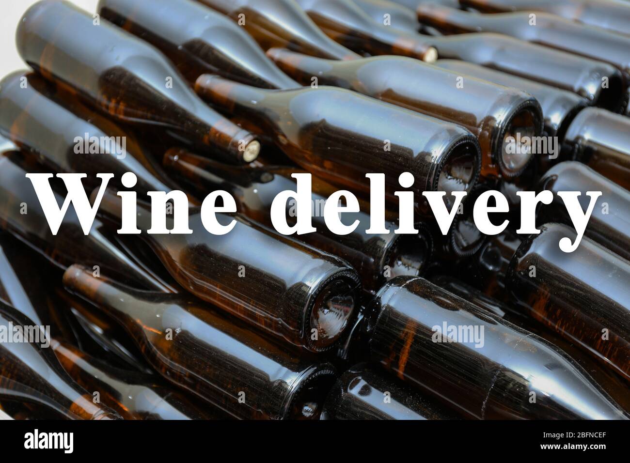 Text WINE DELIVERY on wine bottles background Stock Photo Alamy