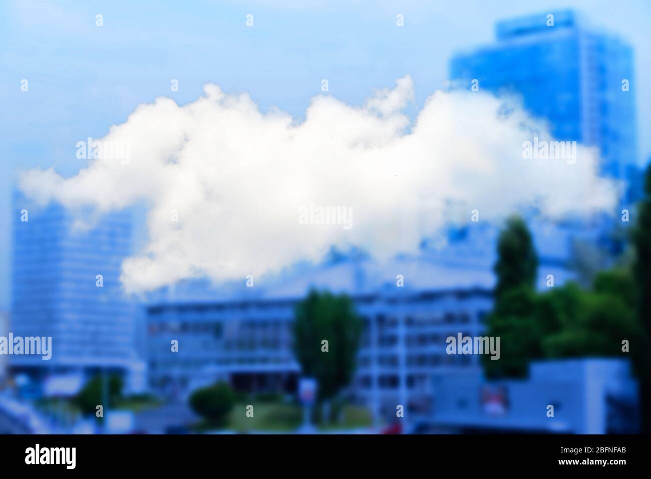 Cloud icon on blurred cityscape background. Modern technology concept Stock Photo