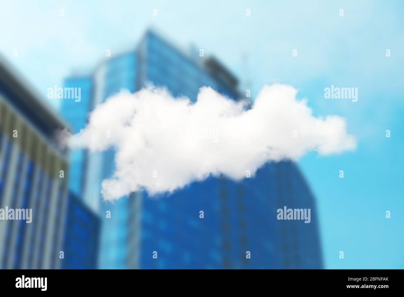 Cloud icon on blurred cityscape background. Modern technology concept Stock Photo