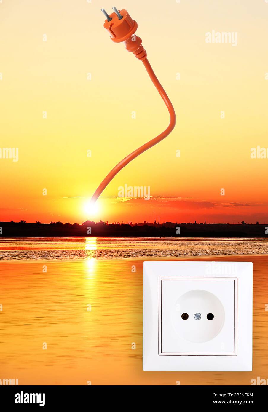 Socket and plug on landscape background Stock Photo - Alamy
