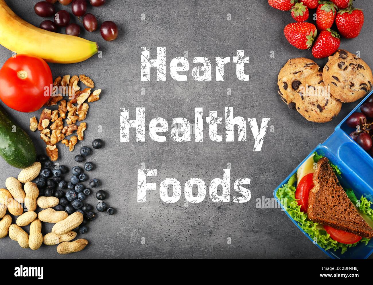 Diet for healthy heart concept. Food on gray background Stock Photo - Alamy