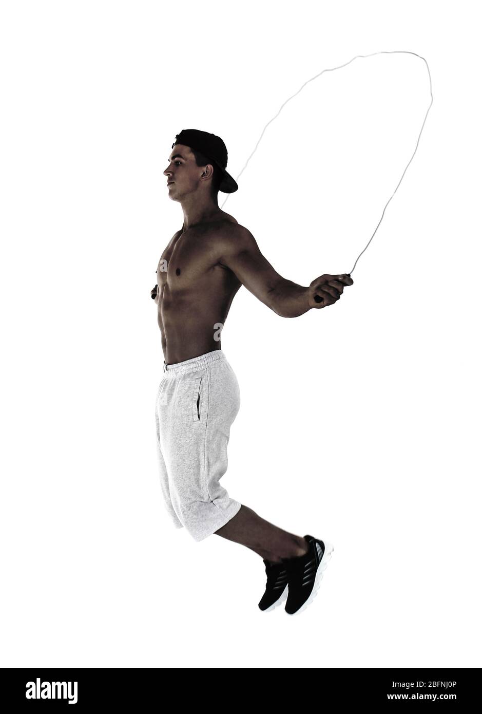 Young athlete skipping rope Cut Out Stock Images & Pictures - Alamy