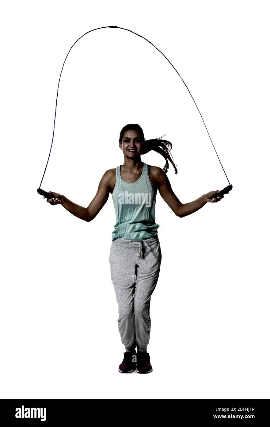 Lady Jump Rope Young woman with jumping rope on white background Stock Photo - Alamy