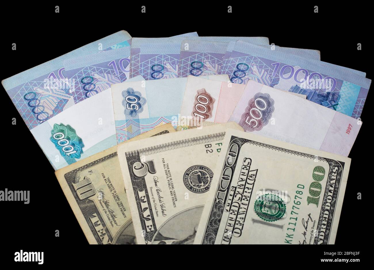 Kazakhstan tenge, Russian rubles, us dollar. Currency exchange, international relations. Dollar rate. Banknotes of different countries Stock Photo