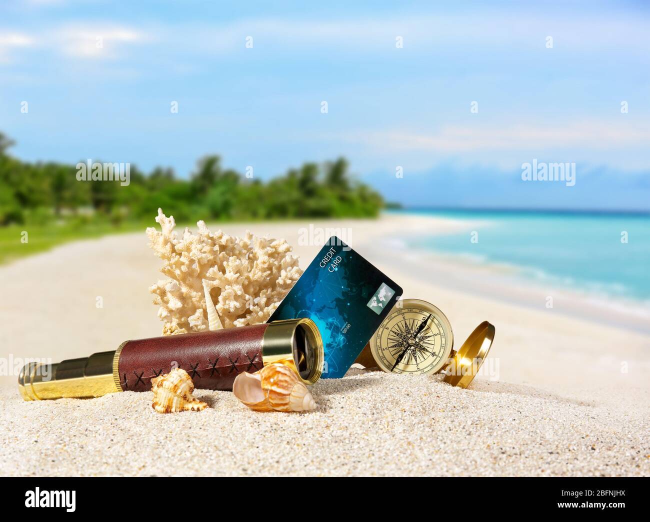 Composition with credit card on tropical beach Stock Photo