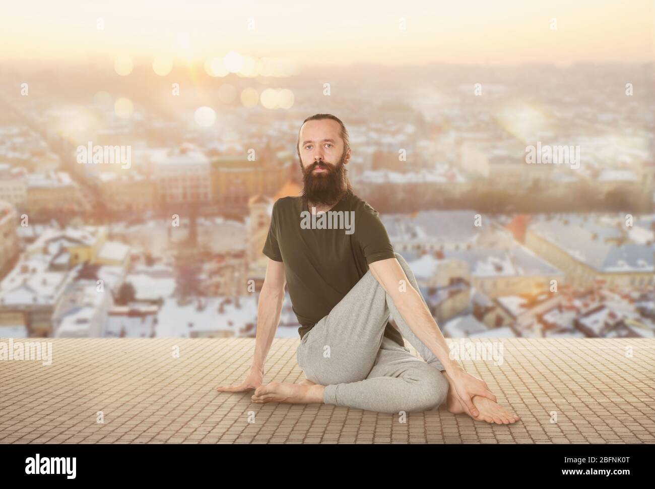 Yoga pose with cityscape background hi-res stock photography and images ...