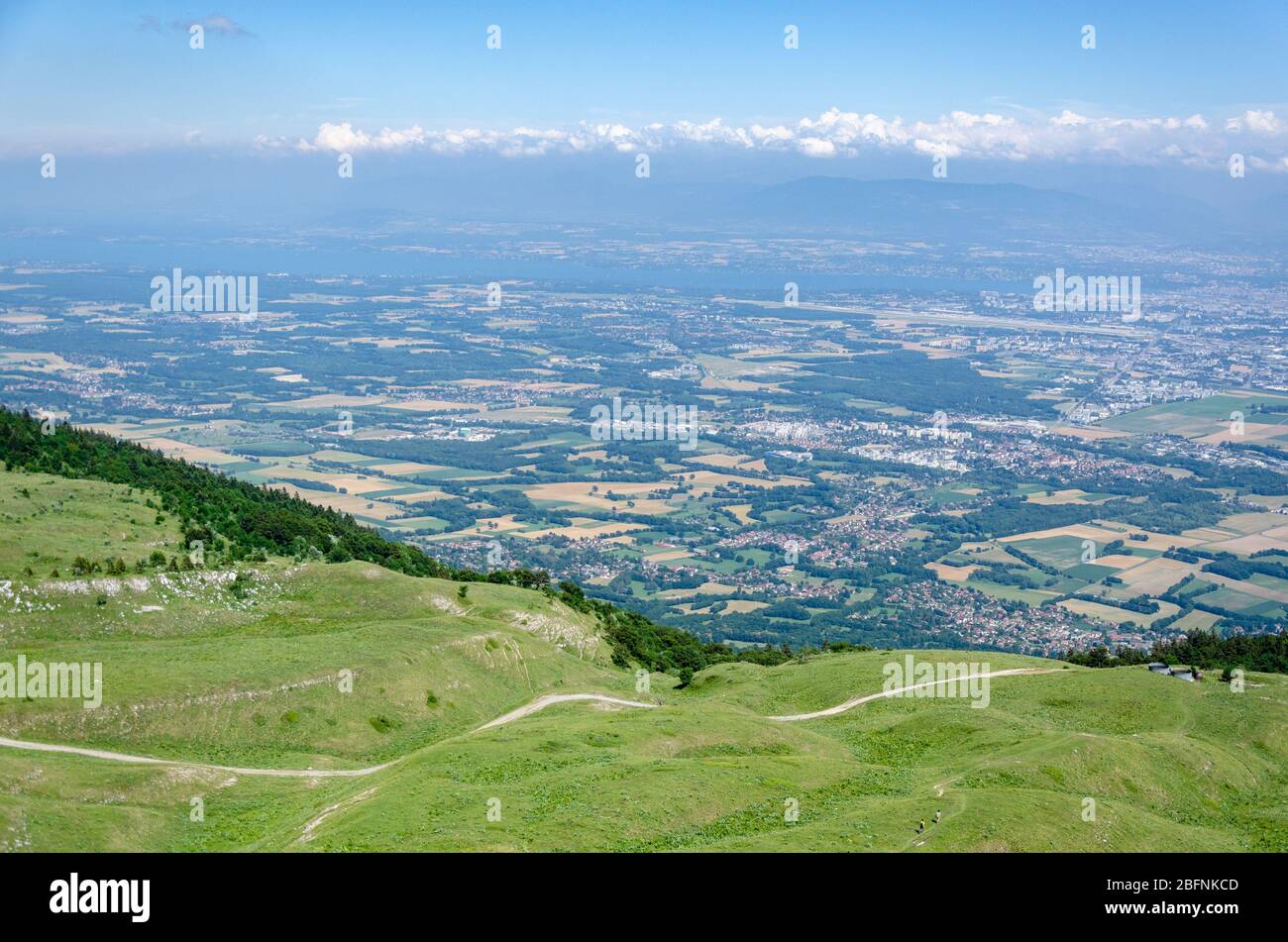 View of the Thoiry region in France and Geneva in Switzerland during summer season from the peak of Le Reculet in Jura Mountains, France Stock Photo