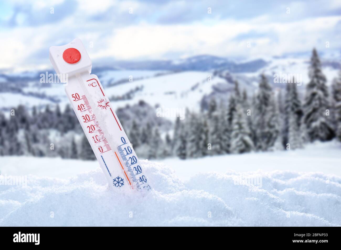 Thermometer registering temperature below zero outdoor Stock Photo Alamy