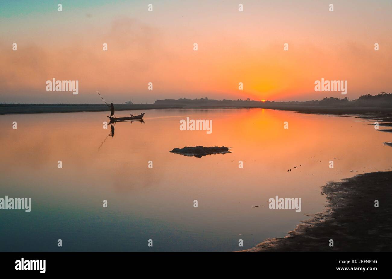 Sunset at The River Brahmaputra in Majuli Island, Assam. Stock Photo