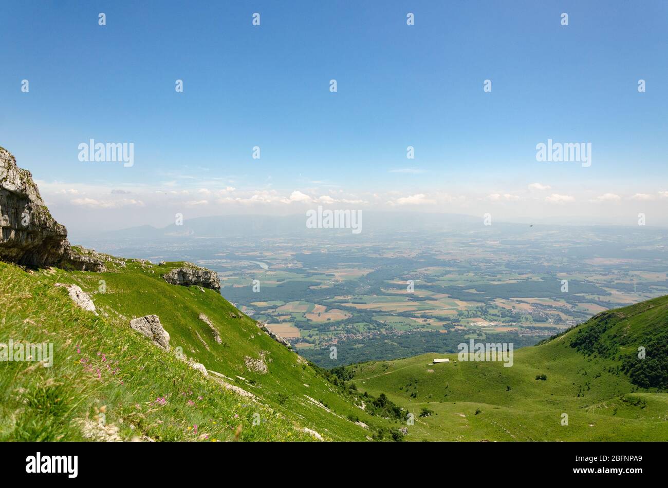 View of the Thoiry region in France and Geneva in Switzerland during summer season while hiking to Le Reculet in Jura Mountains, France Stock Photo