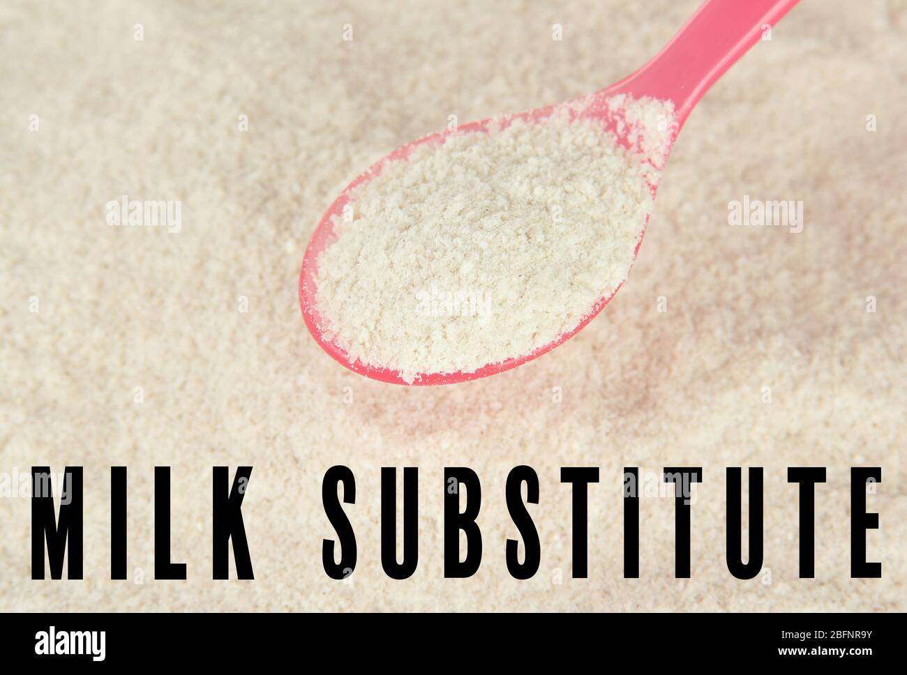Food substitute concept. Powdered baby milk formula and spoon, closeup ...