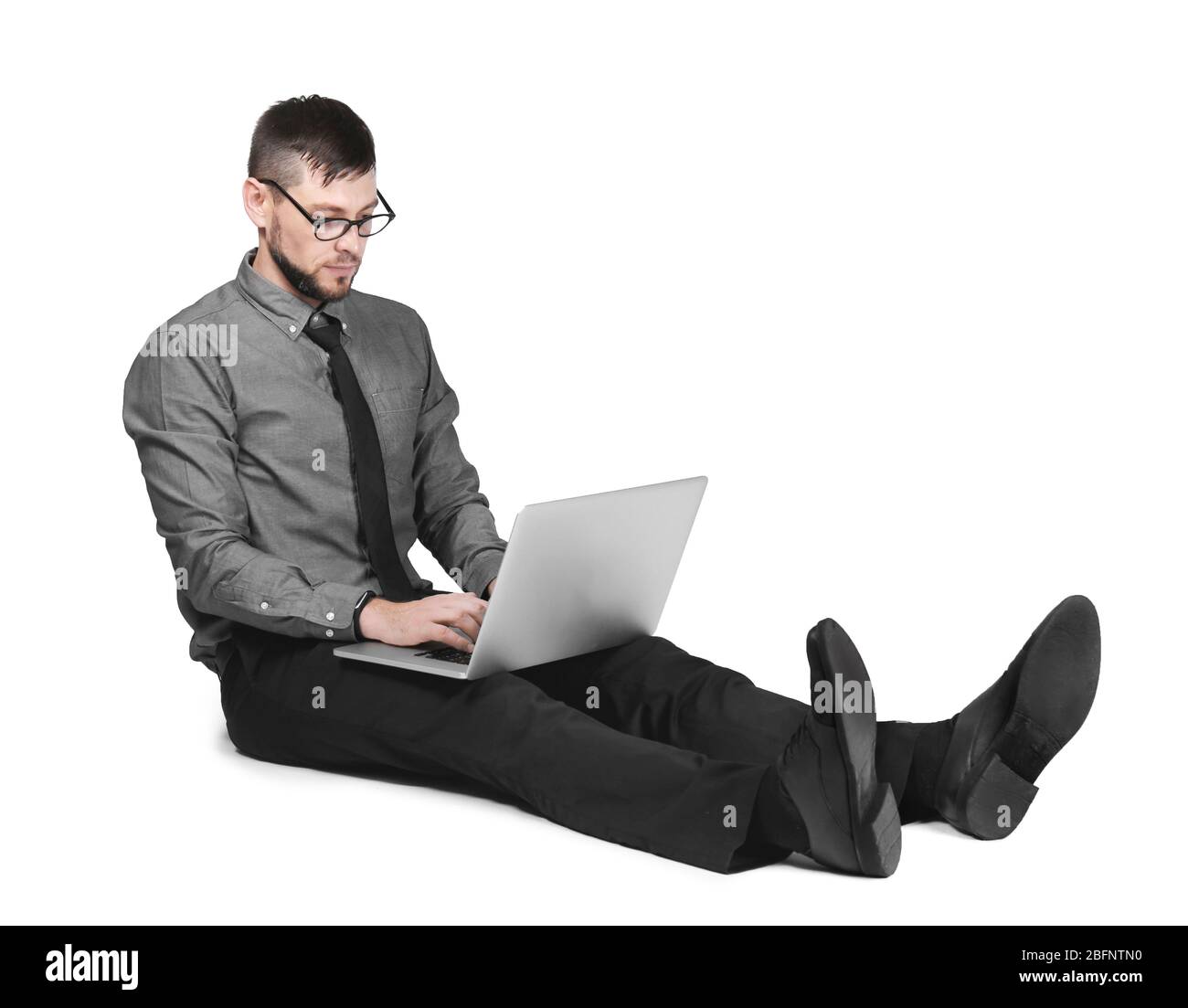 Handsome programmer with laptop on white background Stock Photo
