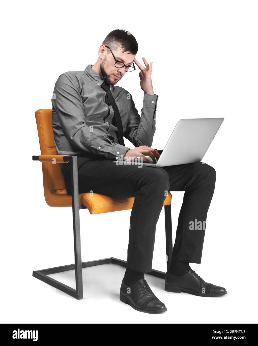 Handsome programmer with laptop on white background Stock Photo