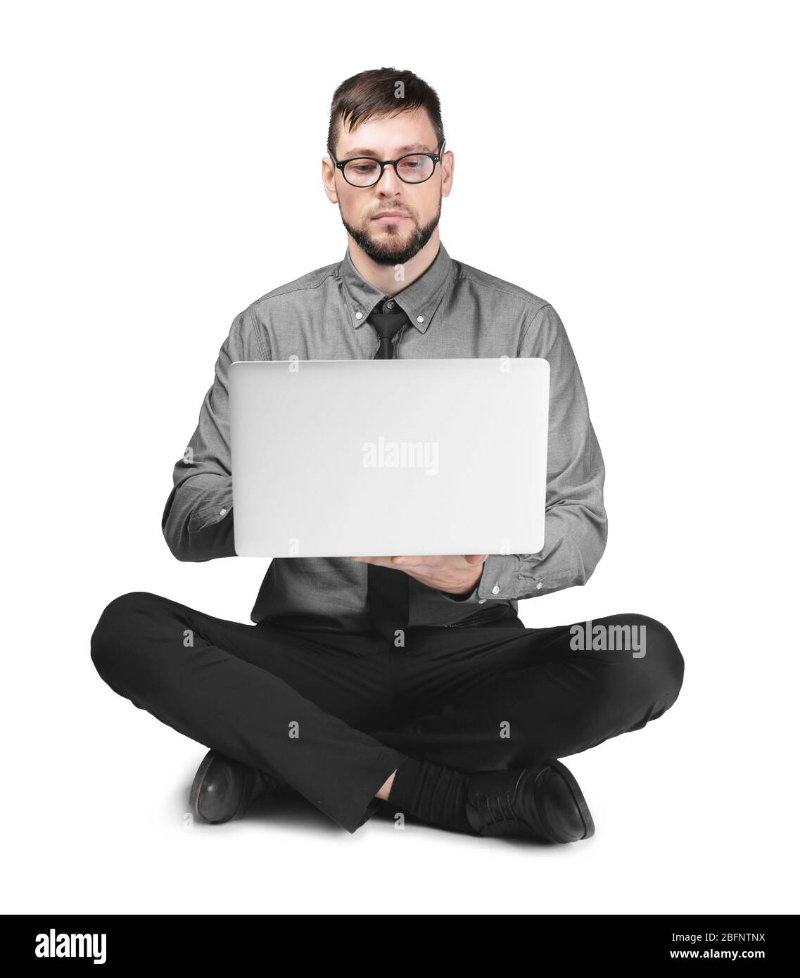 Handsome programmer with laptop on white background Stock Photo
