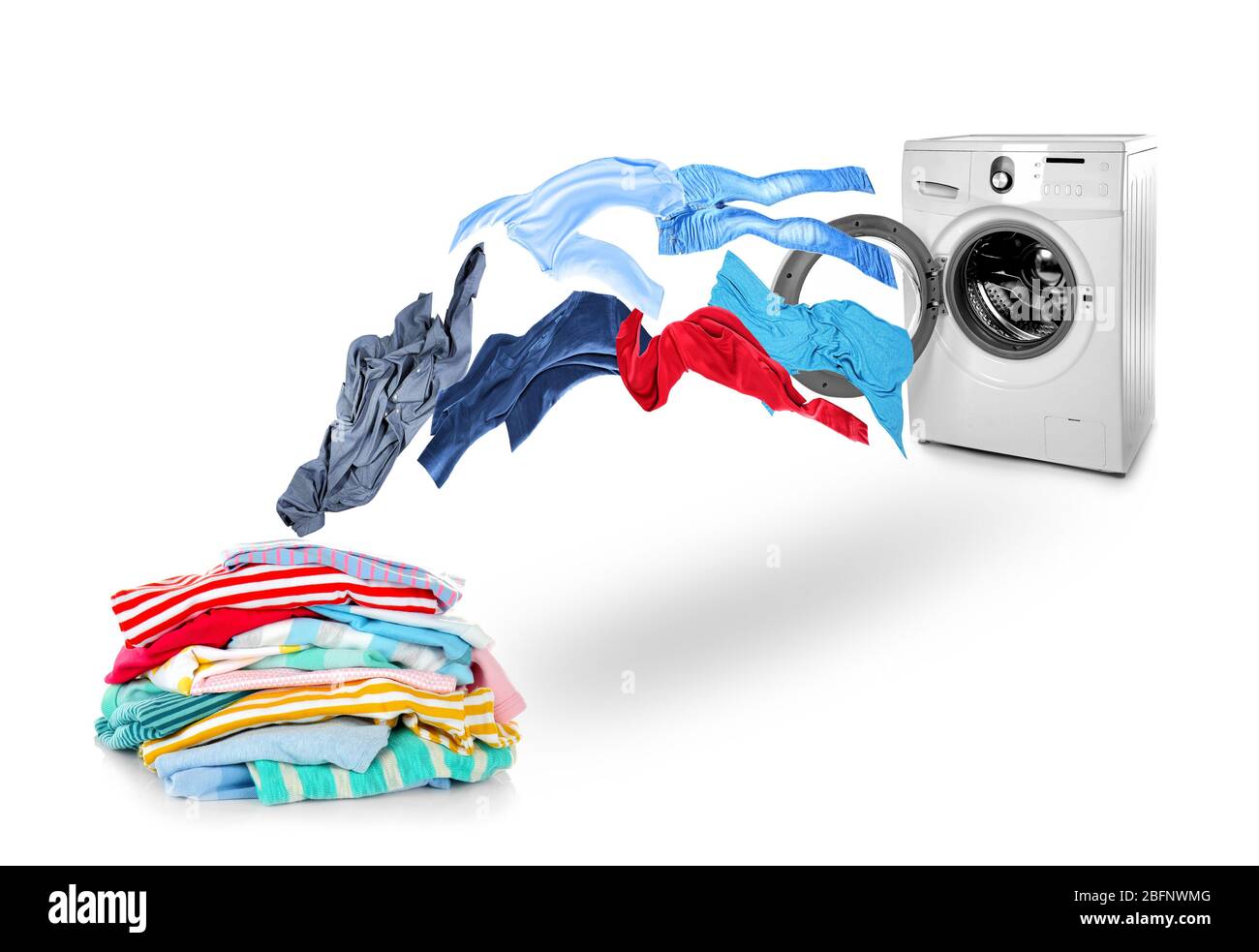 Washing machine and flying clothes on white background Stock Photo - Alamy