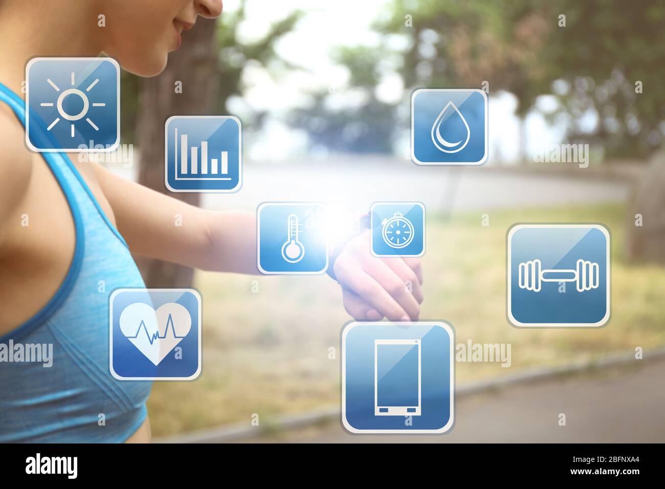 Sport application concept. Young woman with fitness tracker outdoor Stock Photo