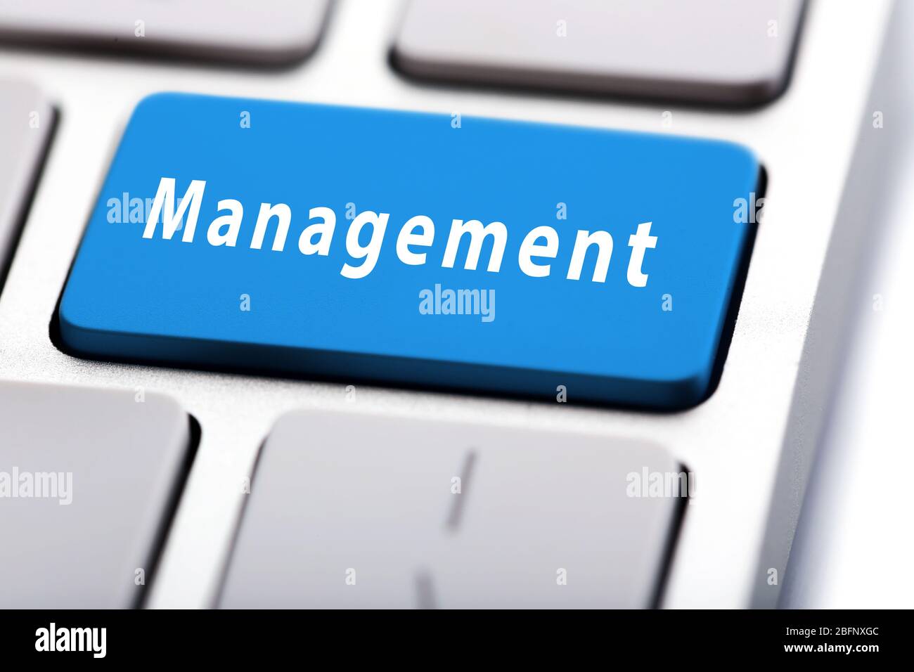 MANAGEMENT button on keyboard, closeup Stock Photo
