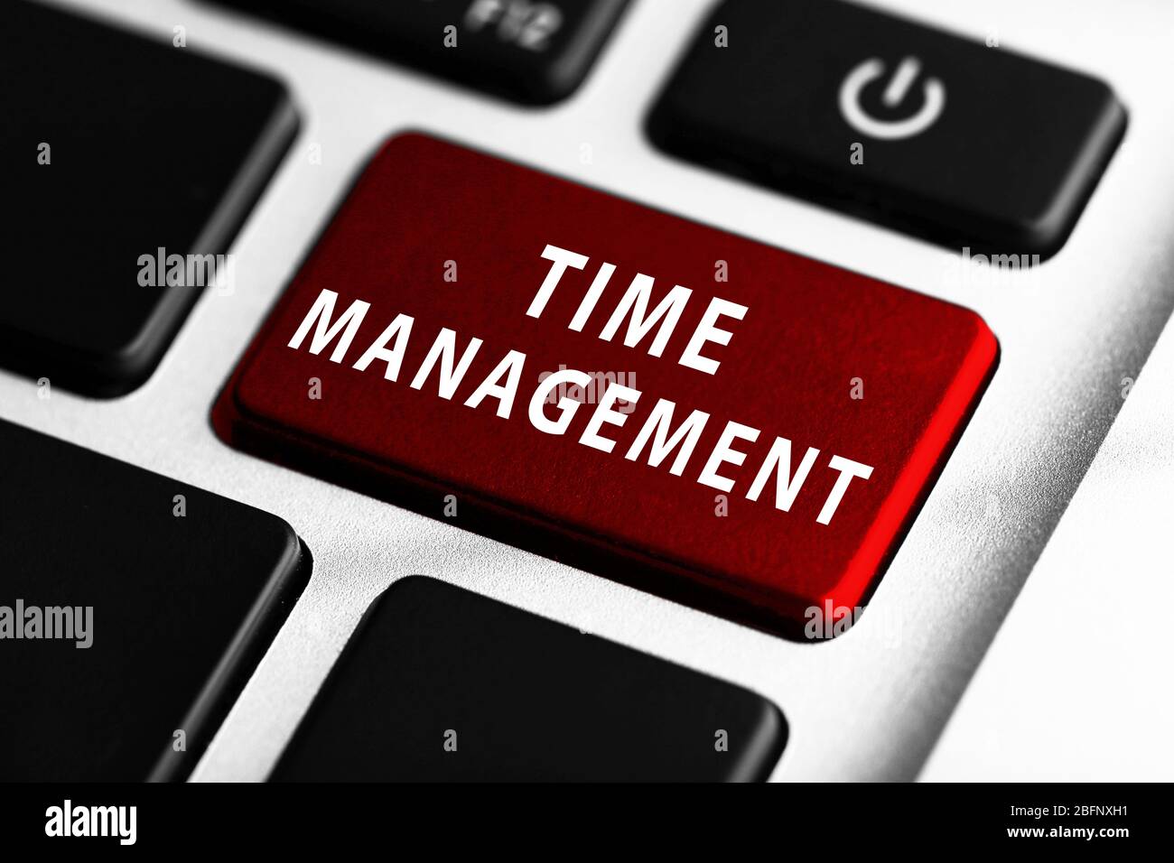 TIME MANAGEMENT button on keyboard, closeup Stock Photo
