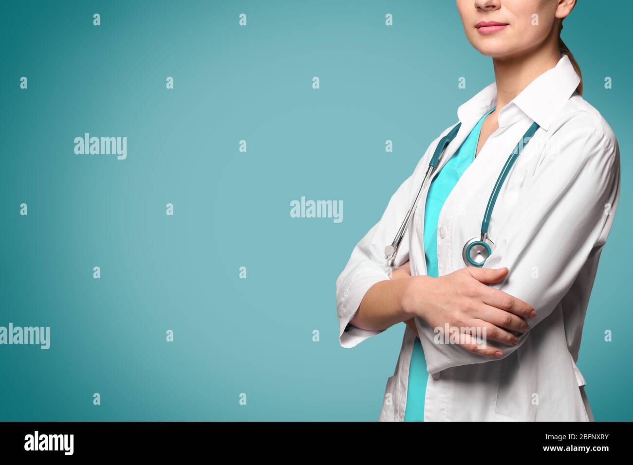Female surgeon on color background Stock Photo - Alamy