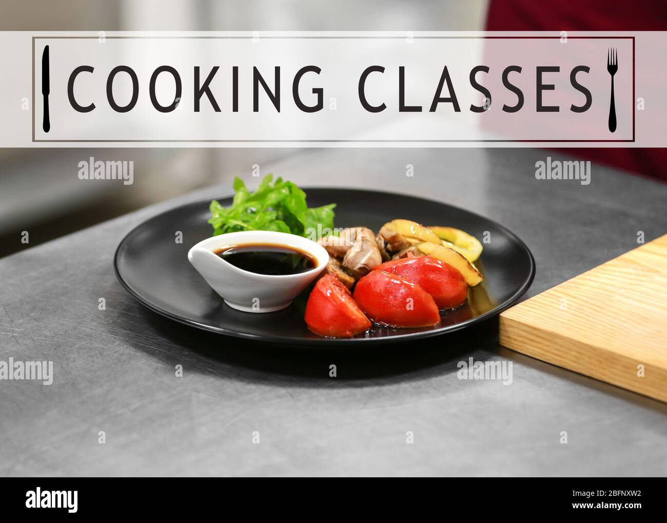 Cooking classes concept. Plate with sauce and fried vegetables on table ...
