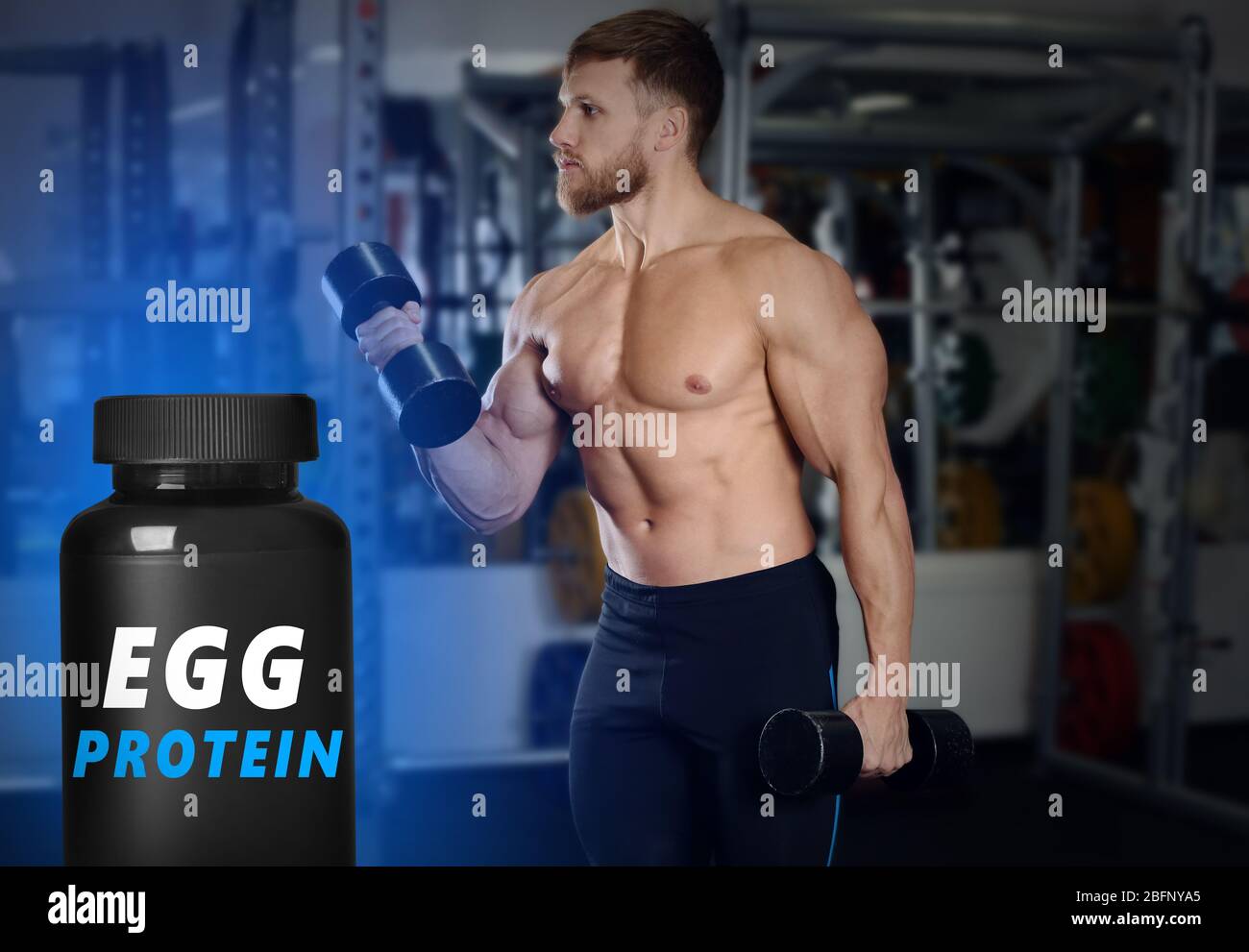 Egg protein concept. Muscular man training in gym Stock Photo Alamy
