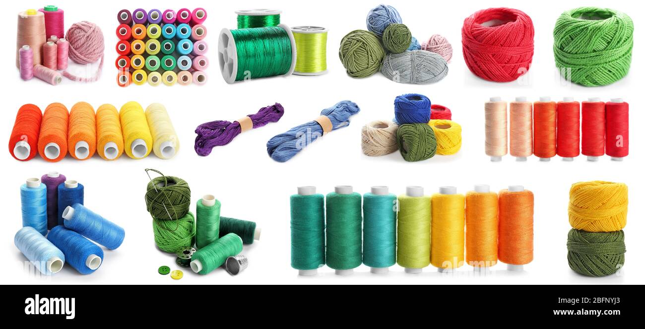 Set of different sewing threads on white background Stock Photo - Alamy
