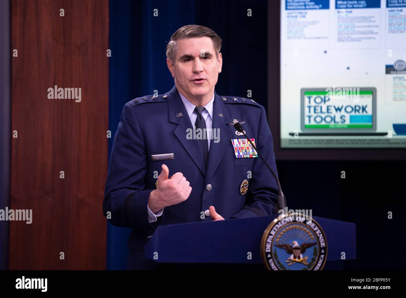 U.S. Air Force Lt. Gen. B.J. Shwedo, Director for Command, Control, Communications, and Computers, Cyber, and Chief Information Officer, Joint Staff, briefs reporters on the COVID-19 pandemic at the Pentagon April 13, 2020 in Arlington, Virginia. Stock Photo