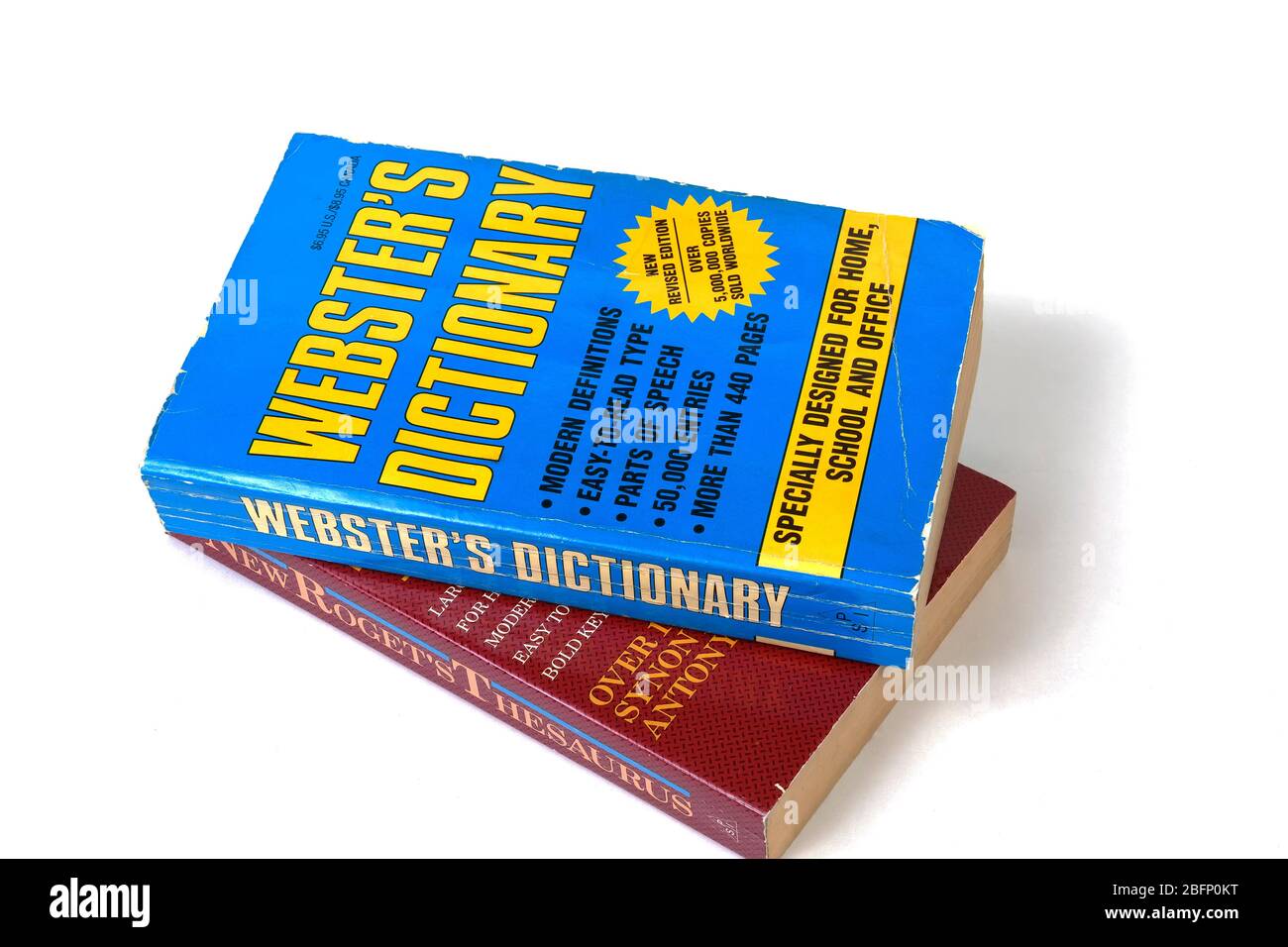 Paperback  English Dictionary and Thesaurus isolated on a pure white background. Stock Photo