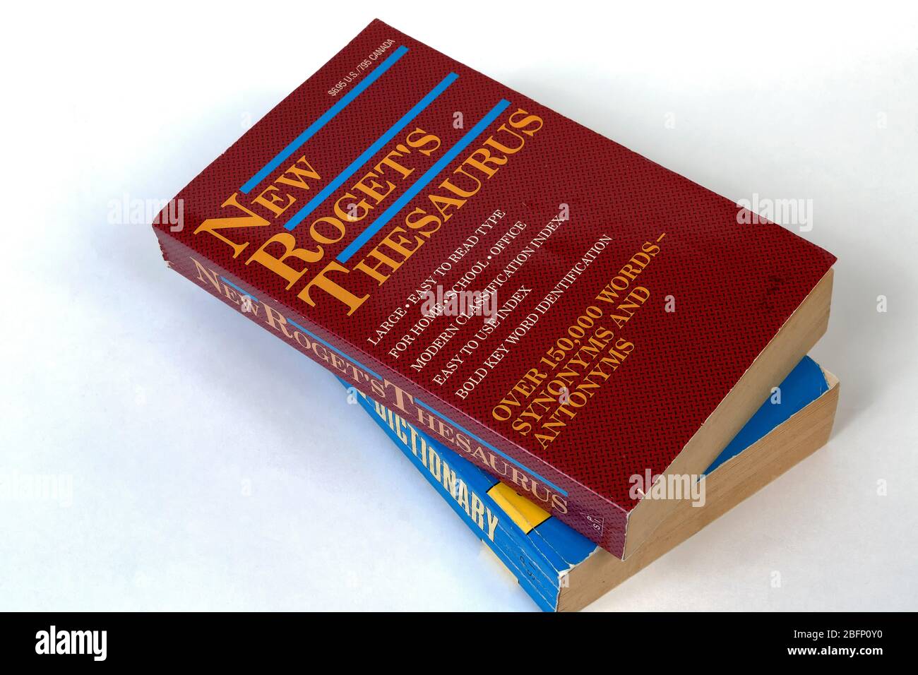 Paperback Thesaurus and  English Dictionary isolated on a pure white background. Stock Photo
