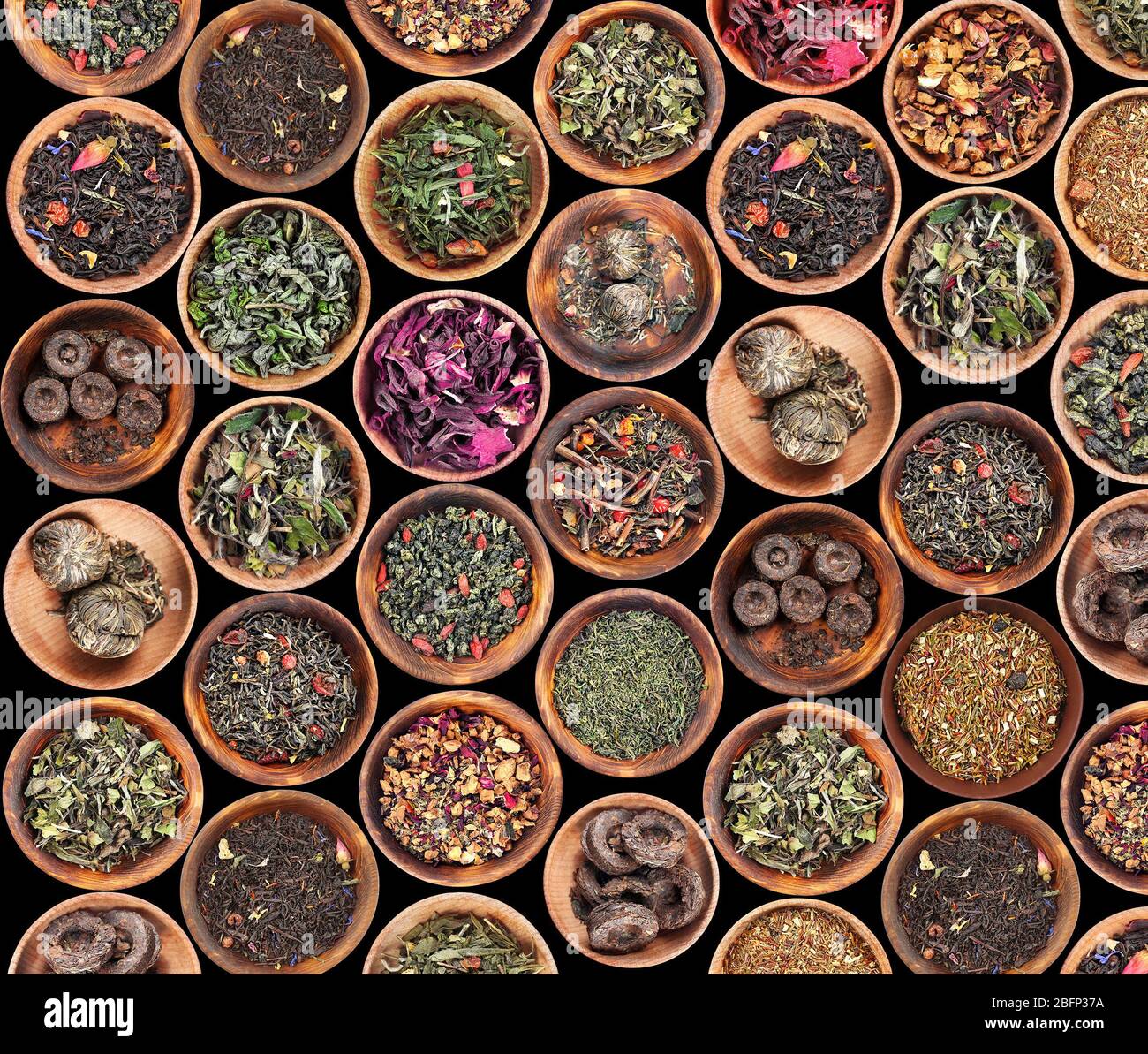Set of different tea in saucer on black background Stock Photo Alamy