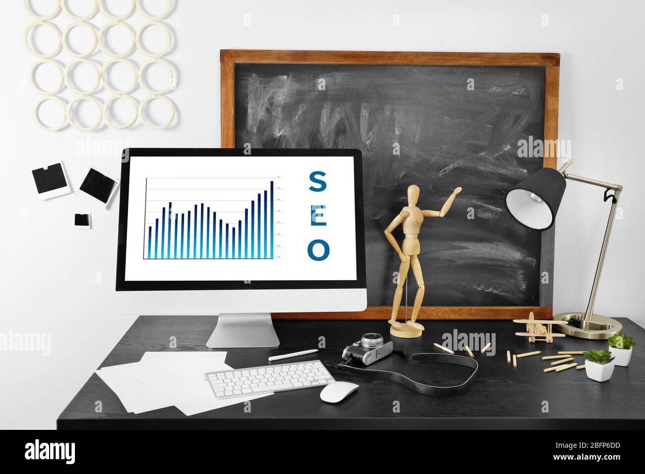 SEO technology concept. Modern workplace interior. Stock Photo
