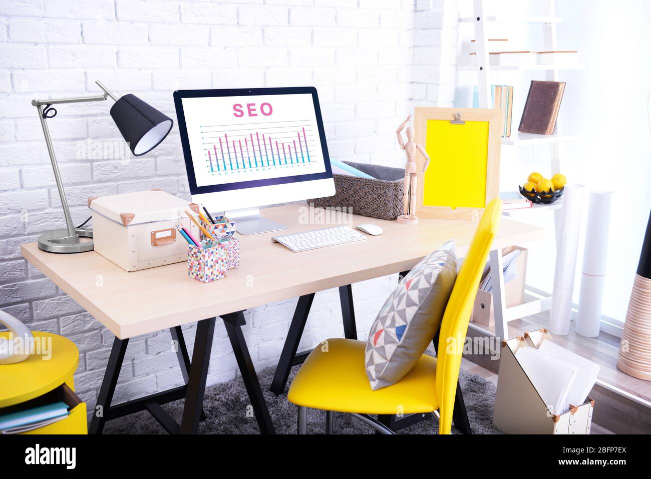 SEO technology concept. Modern workplace interior. Stock Photo