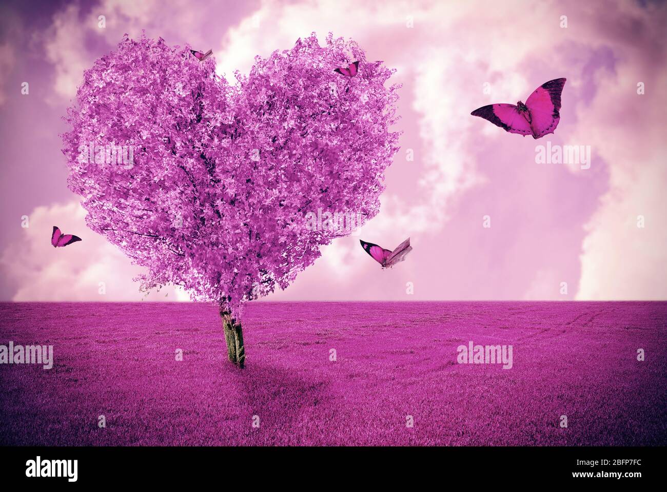 Beautiful field with heart shape tree and butterflies. Abstract pink