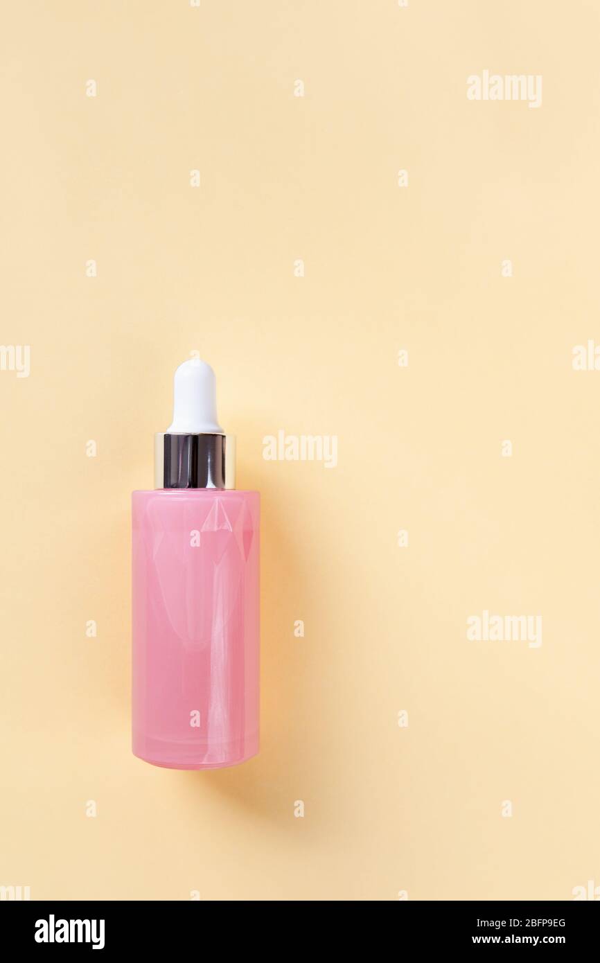 Serum For Face Or Eye Skin In Beautiful Pink Bottle With Dropper On Yellow Background Concept Of Beauty Youth Personal Care Home Or Professional S Stock Photo Alamy
