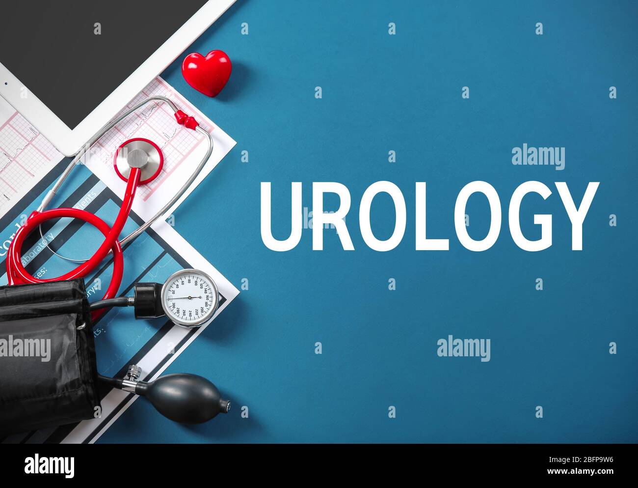 Medical manometer and a stethoscope on color background. Urology