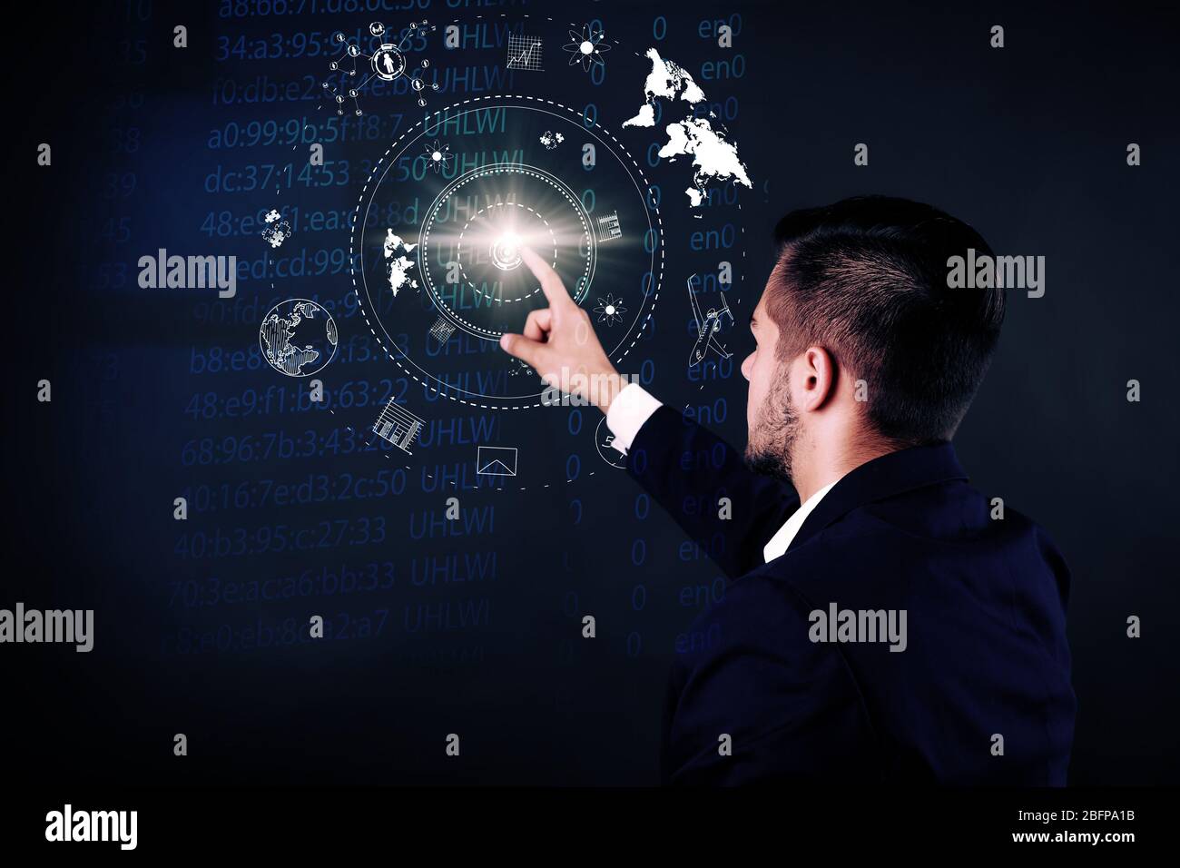 Businessman working with virtual touchscreen. Virtual button on display. Technology concept. Stock Photo