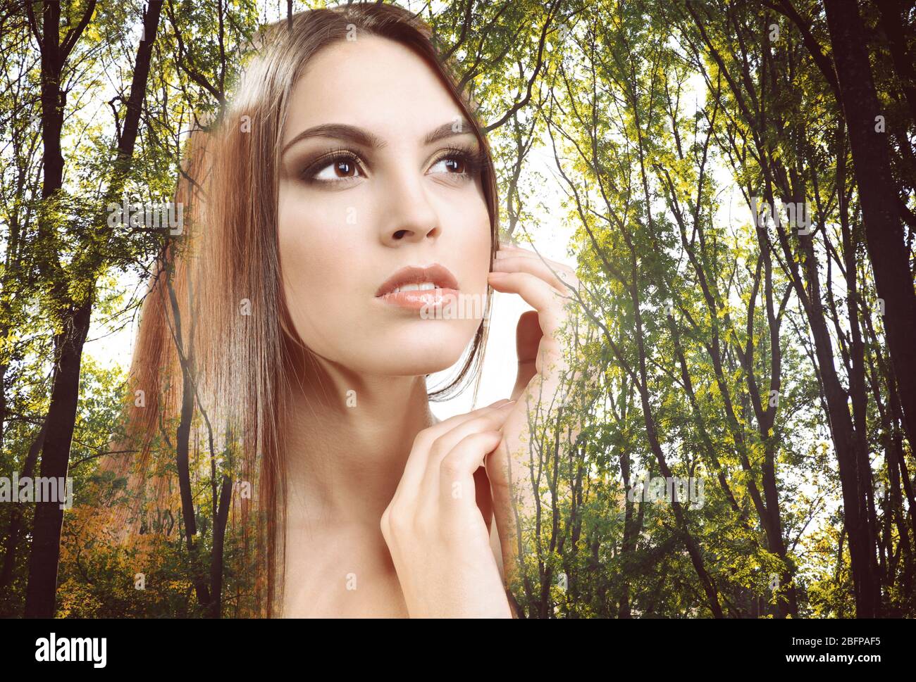 Double exposure of attractive young woman and nature background ...