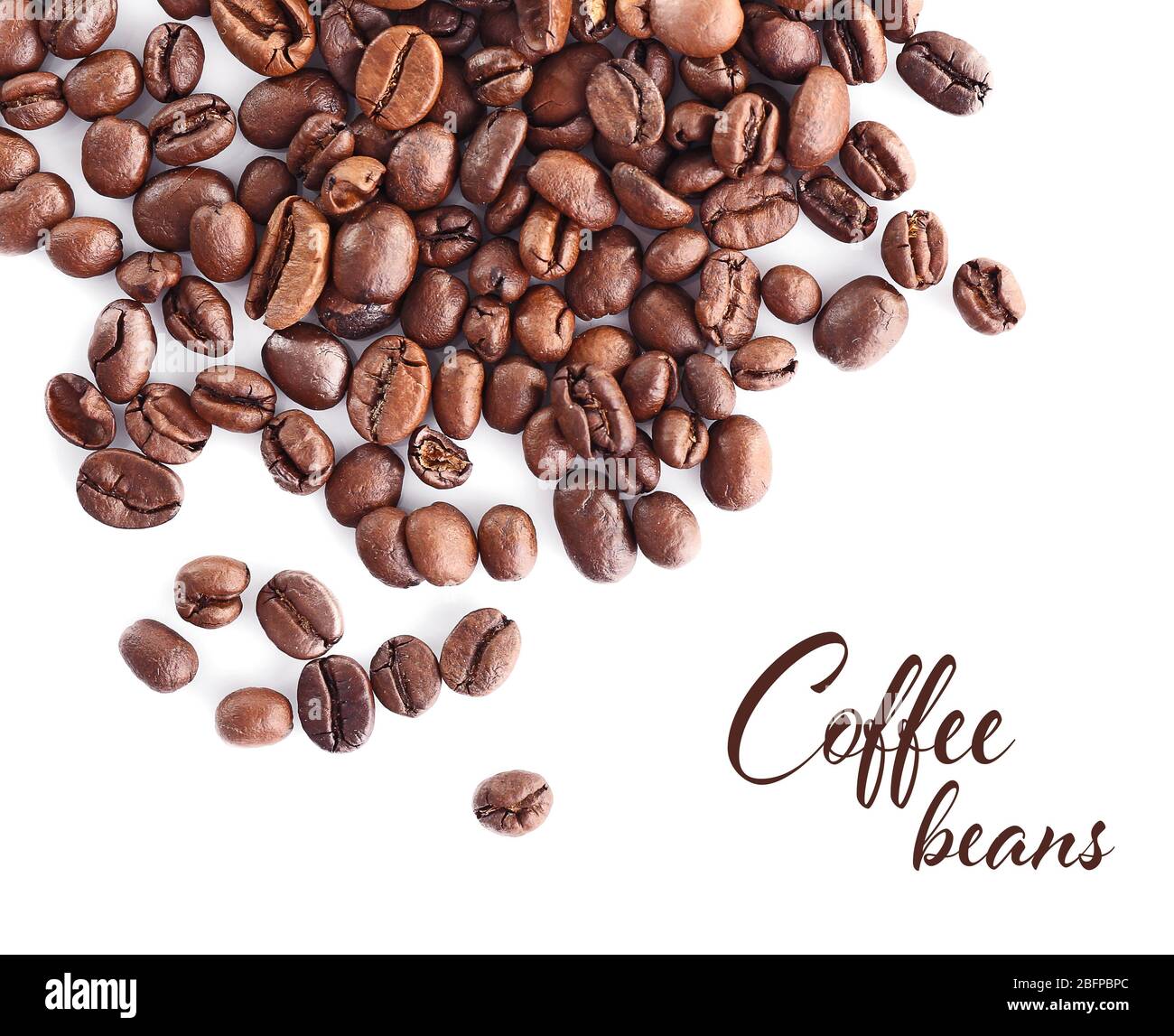 Roasted coffee beans on white background. Text COFFEE BEANS Stock Photo ...