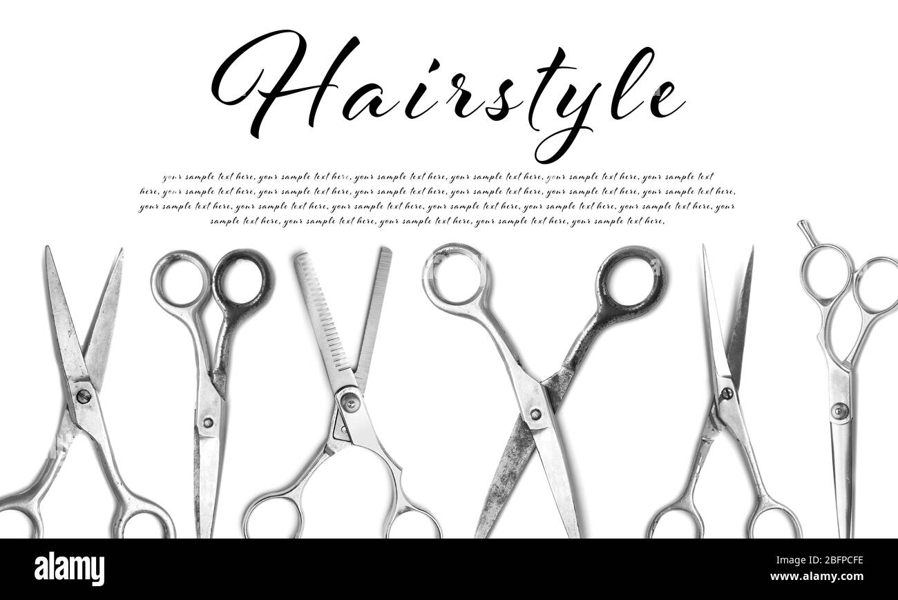 Different types of professional hairdresser scissors. Word HAIRSTYLE on white background Stock Photo