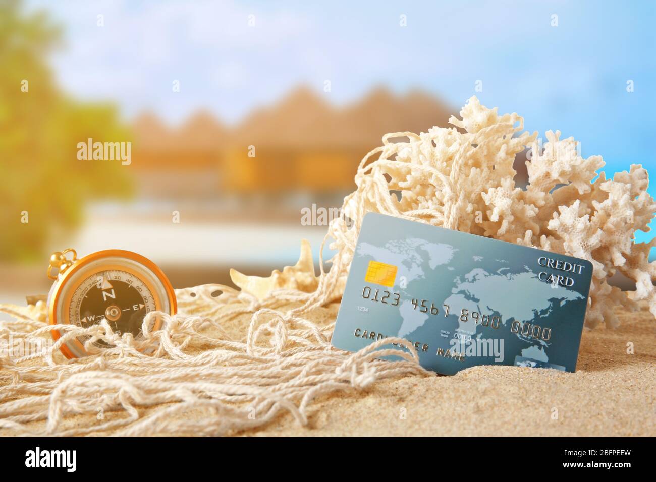 Travel concept. Credit card and resort on background Stock Photo